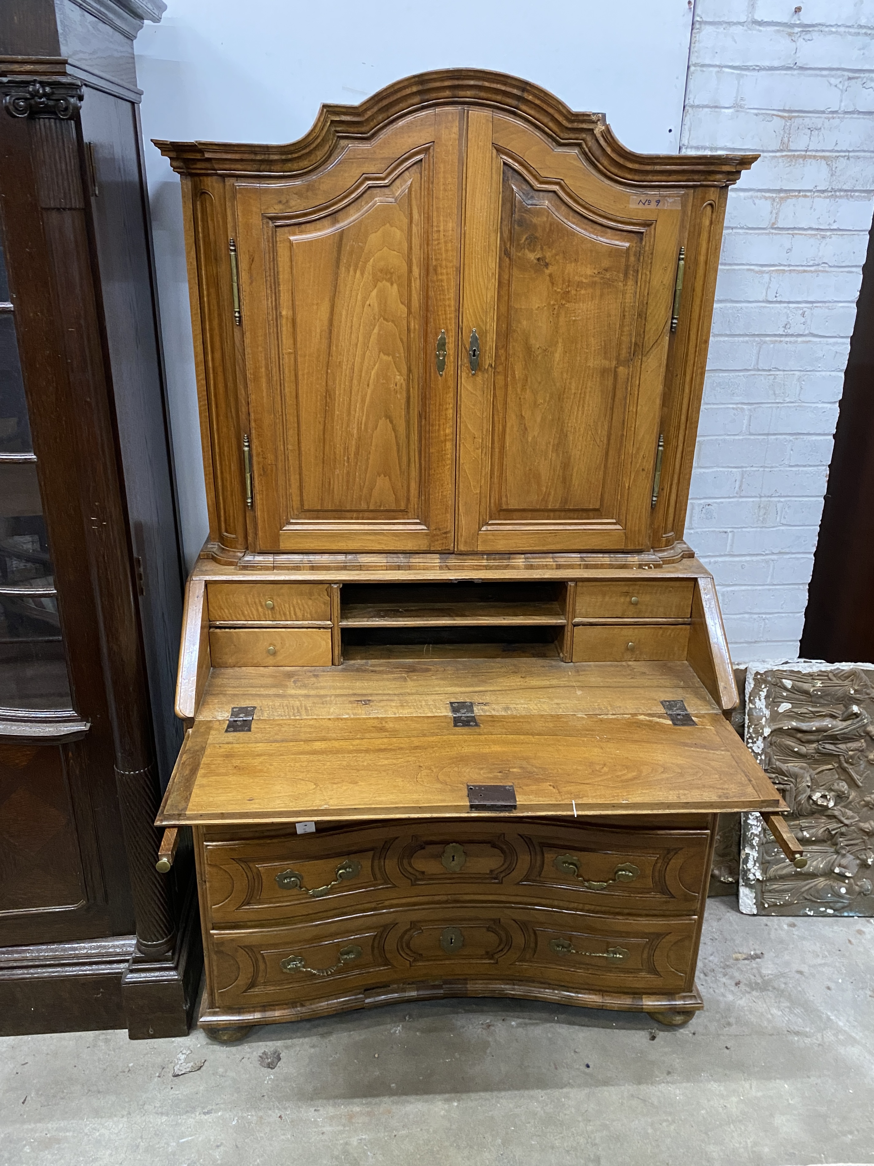 A 19th century German walnut bureau cabinet, width 105cm, depth 57cm, height 188cm, *Please note the sale commences at 9am.